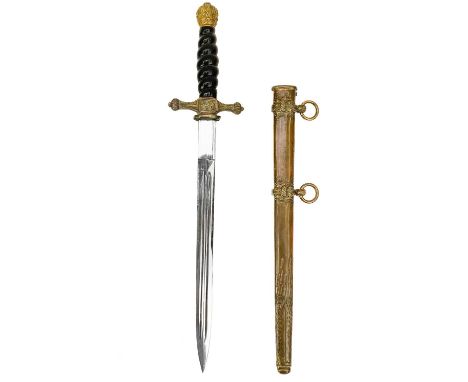 An Imperial German Naval dirk.  1920s, with 25cm plain double edge steel blade, brass hilt with fouled anchor, black celluloi