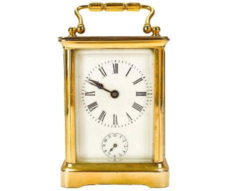 A French brass carriage clock circa 1900. White enamel alarm dial and bell fitted to base, height 11cm.