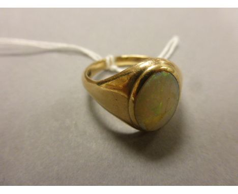 A 9 carat gold and opal signet ring 