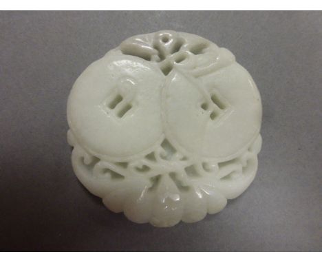 A Chinese white jade pendant necklace