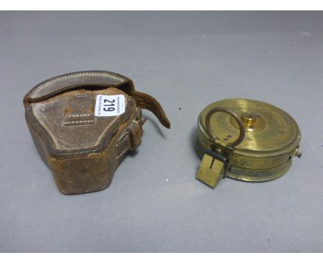 A 19th century brass compass, in a fitted leather case, by Cary of London
