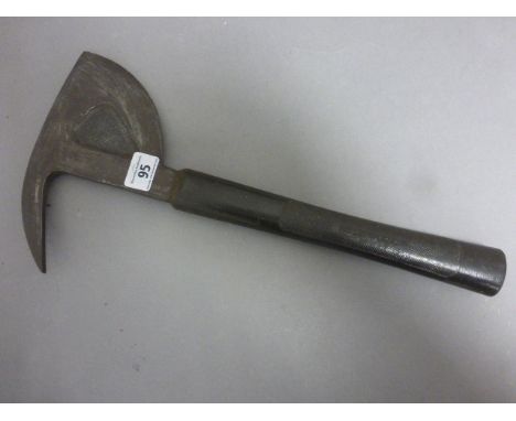 A military axe, with a rubber handle and impressed marks 