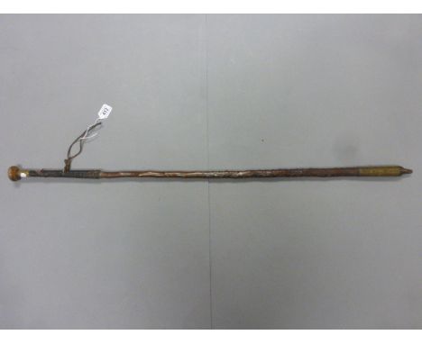 A 19th century wooden walking/spear stick, with a ivory knob, and concealed spear, with brass mounts the base marked "J Ainci