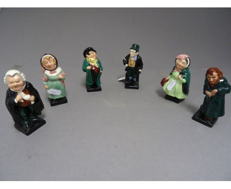 Six Royal Doulton Dickens figures to include Sairey Gamp, Buzfuz, Bill Sikes, Mrs Bardell, Fagin and Tony Weller