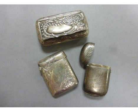 Two Victorian silver vesta cases, along with a continental snuff box 