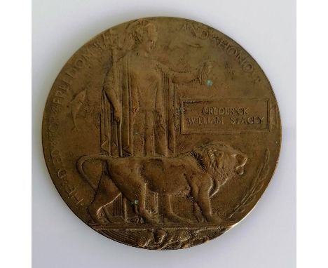 A WWI memorial plaque / bronze death penny named to Frederick William Stacey, with original envelope
Royal Mail postage withi