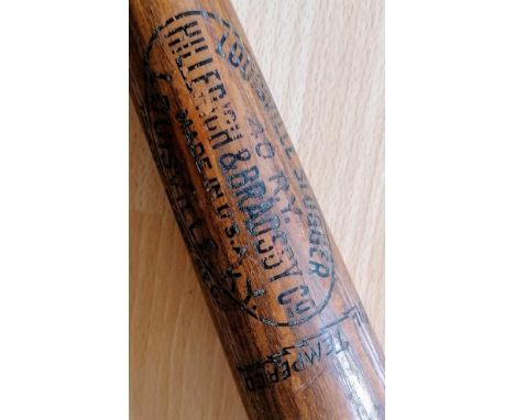A U.S. Army Louisville Slugger, oil tempered, signed Rudolph York, size 34