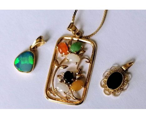 A yellow gold panel pendant with multi-coloured jade decoration and chain, two other smaller gem-set pendant, all stamped 14k