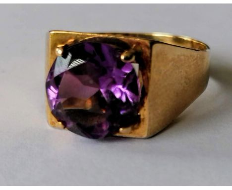 A mid-century 9ct yellow gold round-cut amethyst ring, 10mm diameter, estimated weight 2.90 carat, size Q, hallmarked, 4.9g w