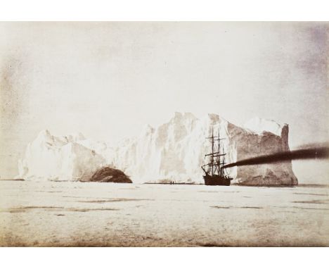 ATTRIBUTED TO JOHN DUNMORE AND GEORGE CRITCHERSON (BRITISH, ACT. 1860)Between the Iceberg and Field Ice; The steamer in an op