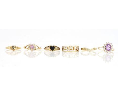 SIX 9CT GOLD RINGS (6)Comprising; an amethyst and diamond heart shaped ring, ring size P and a half, a mauve and colourless g
