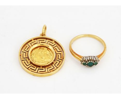 AN 18CT GOLD, EMERALD AND DIAMOND RING AND A GOLD PENDANTThe emerald and diamond ring mounted with three emeralds within a su