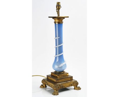 A FRENCH ORMOLU AND BLUE OPALINE GLASS MOUNTED TABLE LAMPMid-19th CenturyAdapted from an oil lamp, with serpent wrapped balus