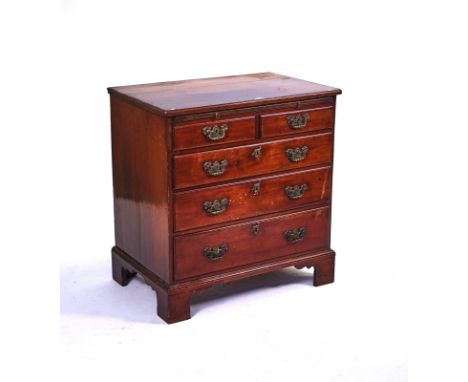 A MID-18TH CENTURY MAHOGANY CHESTWith brushing slide over five various drawers, 81cm wide; 50.5cm deep; 84cm highCondition re