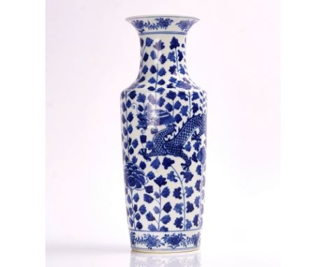 A CHINESE BLUE AND WHITE ROULEAU VASELate 19th/early 20th centuryPainted with two confronting dragons amongst flowers, four c