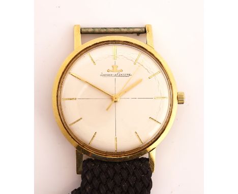 A JAEGER-LE COULTRE GOLD CASED GENTLEMAN'S WRISTWATCHThe signed dial with baton shaped numerals, gilt hands and with centre s