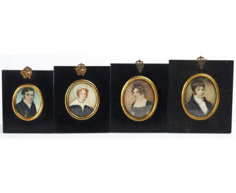 FOUR PORTRAIT MINIATURESEarly 19th CenturyEach oval, watercolour on ivory, mounted in ebonised&nbsp; frames, the largest appr