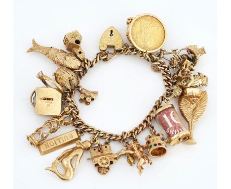 A 9CT GOLD CURB LINK CHARM BRACELETFitted with twenty-two mostly 9ct gold pendants and charms, including a Victoria old head 