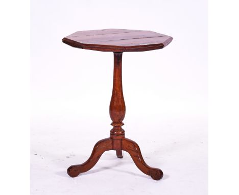 AN EARLY 19TH CENTURY SOLID YEW OCTAGONAL TRIPOD OCCASIONAL TABLEWith baluster turned column, 51cm wide; 70cm high