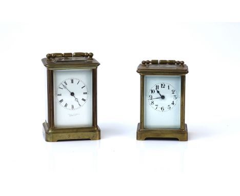 A FRENCH BRASS CASED CARRIAGE CLOCK AND ANOTHER (2)A French brass cased carriage clock, the visible platform escapement detai