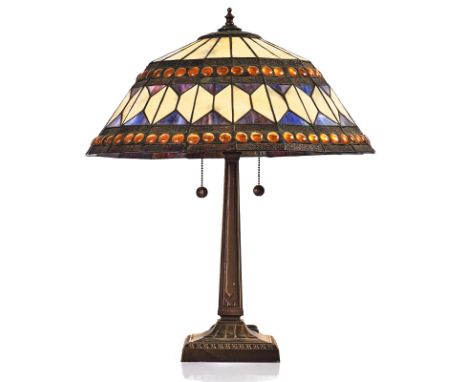 A TIFFANY STYLE TABLE LAMPModernThe stained and leaded glass shade above a twin light fitment with pull string cords detailed