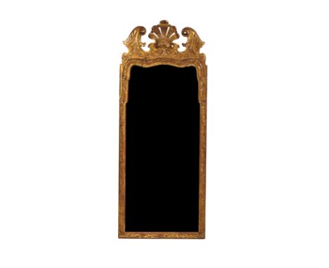 A GEORGE II STYLE GILT FRAMED WALL MIRRORWith shell crest and two part plate, 47cm wide; 120cm highCondition report:&nbsp;The