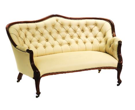 A VICTORIAN ROSEWOOD FRAMED SOFAWith later cream leather upholstery, 164cm wide; 92cm high