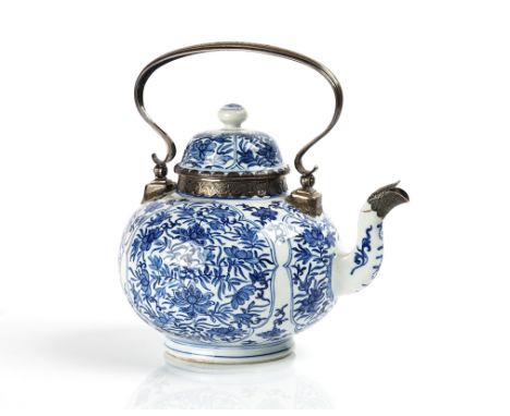 A CHINESE BLUE AND WHITE EXPORT TEAPOT AND COVER WITH SILVER MOUNTSThe porcelain Kangxi, the mounts Dutch or French, 19th cen