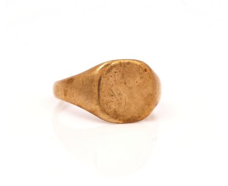 A 9CT GOLD SIGNET RINGWith traces of engraved initials, Birmingham 1937, weight 6.5 gms