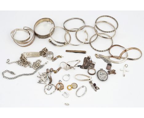 A COLLECTION OF MOSTLY SILVER JEWELLERY (42)Comprising; ten bangles, four bracelets, three rings, two neckchains, a tie slide