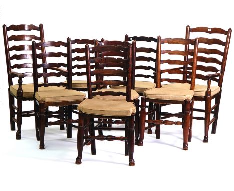A MATCHED SET OF EIGHT LANCASHIRE LADDER BACK DINING CHAIRSTo include a pair of carvers (8)