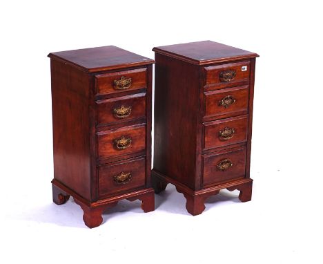 A PAIR OF WALNUT FOUR DRAWER BEDSIDE CHESTSOn bracket feet, 38cm wide; 77cm high (2)