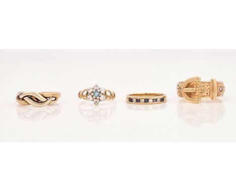 A 9CT GOLD, SAPPHIRE AND DIAMOND RING AND THREE FURTHER 9CT GOLD RINGS, (4)The sapphire and diamond ring mounted with fire ci