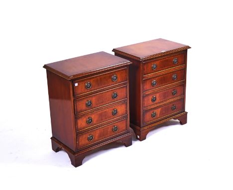 A PAIR OF MAHOGANY THREE DRAWER BEDSIDE CHESTSOn bracket feet, 49cm wide; 63cm high (2)