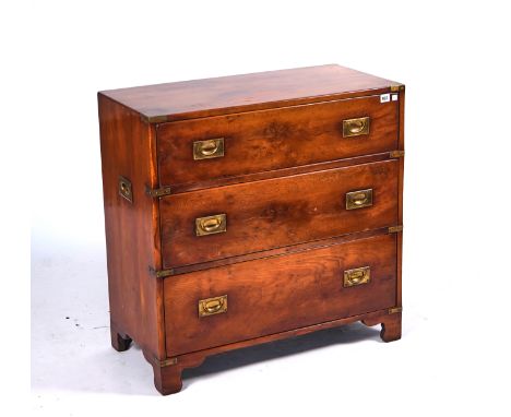 A CAMPAIGN STYLE BRASS BOUND YEW WOOD CHESTWith three long drawers, 81cm wide; 40.5cm deep; 81cm highCondition report:&nbsp;O
