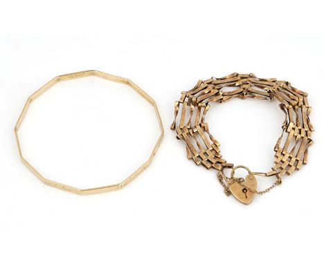 A 9CT GOLD BANGLE AND A 9CT GOLD BRACELET (2)The 9ct gold faceted bangle with decorated panels alternating with plain panels,
