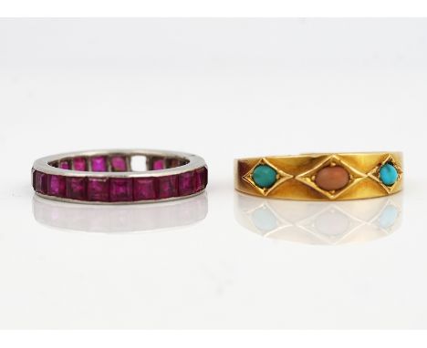 A RUBY FULL ETERNITY RING AND ANOTHER RING (2)The ruby full eternity ring mounted with square cut rubies (one ruby lacking), 