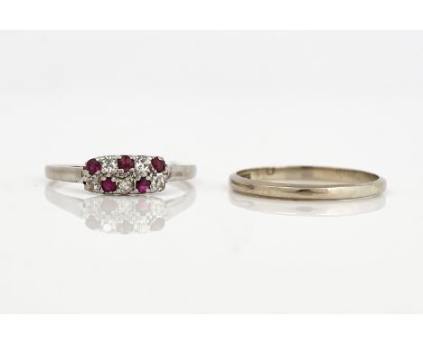 A RUBY AND DIAMOND RING AND ANOTHER RING (2)The ruby and diamond ring mounted with two rows of alternating circular cut rubie