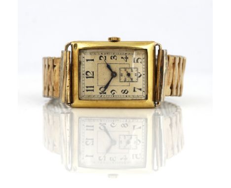 AN 18CT GOLD RECTANGULAR CASED GENTLEMAN'S WRISTWATCHThe circular jewelled movement detailed Swiss Made, the rectangular silv
