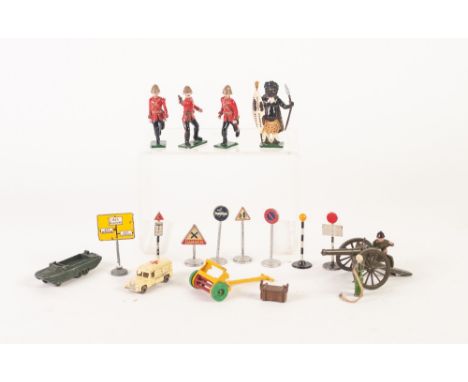 DINKY TOYS YELLOW, RED AND GREEN TWO WHEEL CYLINDER LAWN MOWER, a selection of  SEVEN ROAD SIDE SIGNS and a  YELLOW DIRECTION