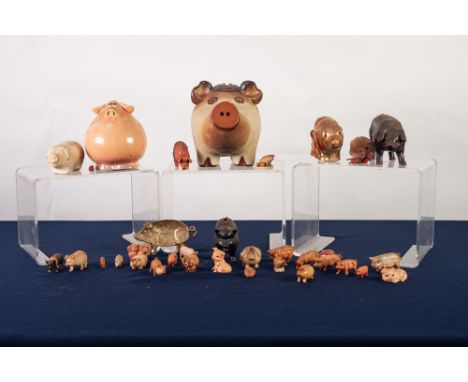THREE CERAMIC PIG MONEY BOXES,  FIVE VARIOUS PIG SHAPED ITEMS AND 26 MINIATURE PIG ORNAMENTS (34) 