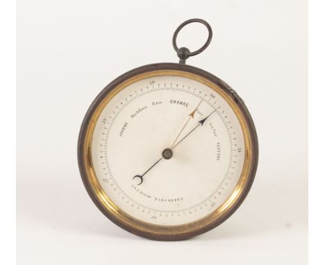 EARLY TWENTIETH CENTURY BOXED ANEROID BAROMETER,  in brass bulkhead type case with white dial and ring suspension, stamped ma