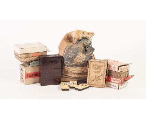 TEN BYGONE PACKETS OF PLAYING CARDS, including one set in brown Bakelite case, together with a SET OF EBONY AND BONE DOMINOES