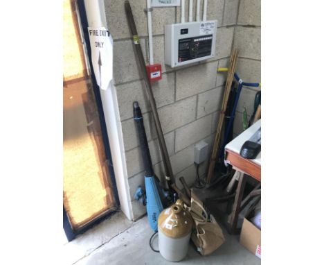 A quantity of garden tools, engine and stoneware flagon