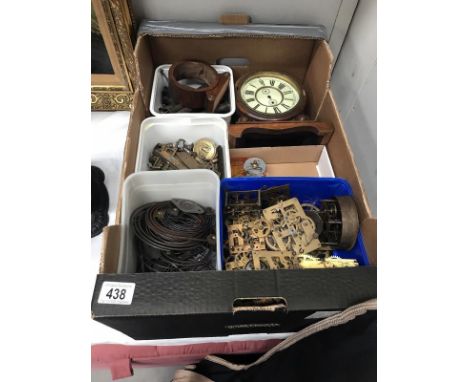 A selection of clock movements, finials, springs etc.