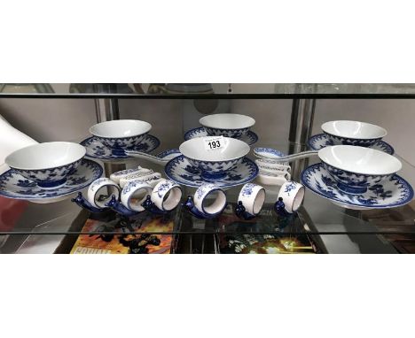 6 Chinese rice bowls on plates, napkin rings, chopstick rest etc.