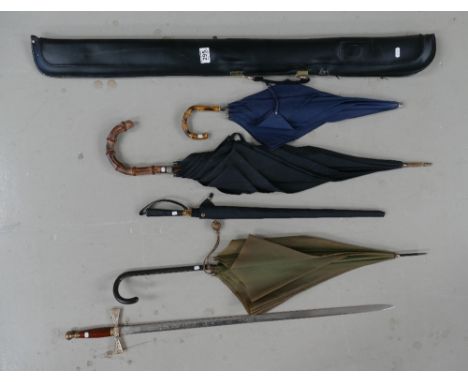 A mixed collection of items to include quality hand made snooker cue, a collection of umbrella's and Wilkinson Sword presenta