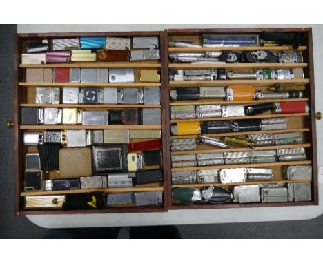 A large collection of butane cigarette lighters including trench art items, barrel tab items, novelty items, Colibri, Pole Li