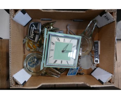 A mixed collection of items to include vintage car mascots, Smiths mantle clock and glass ash trays.