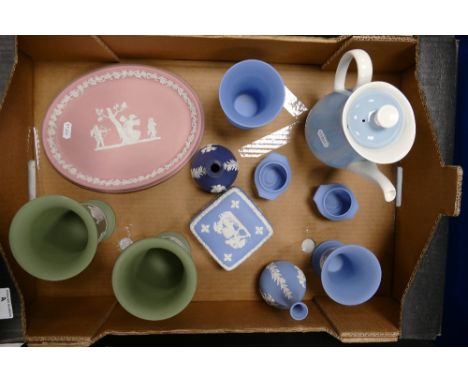 A mixed collection of Wedgwood items to include sage green vases, jasperware trinket boxes, lighters together with white on p